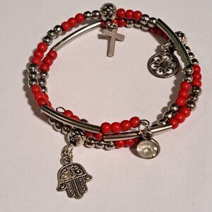 red and silver tone spiral charm bracelet cross flower hand